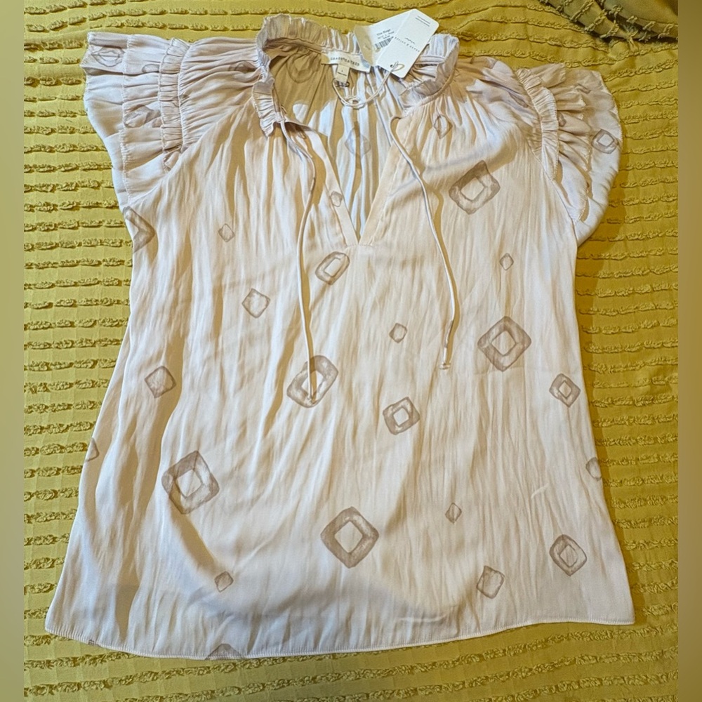 Chic Beige Patterned Blouse with Ruffle Sleeves